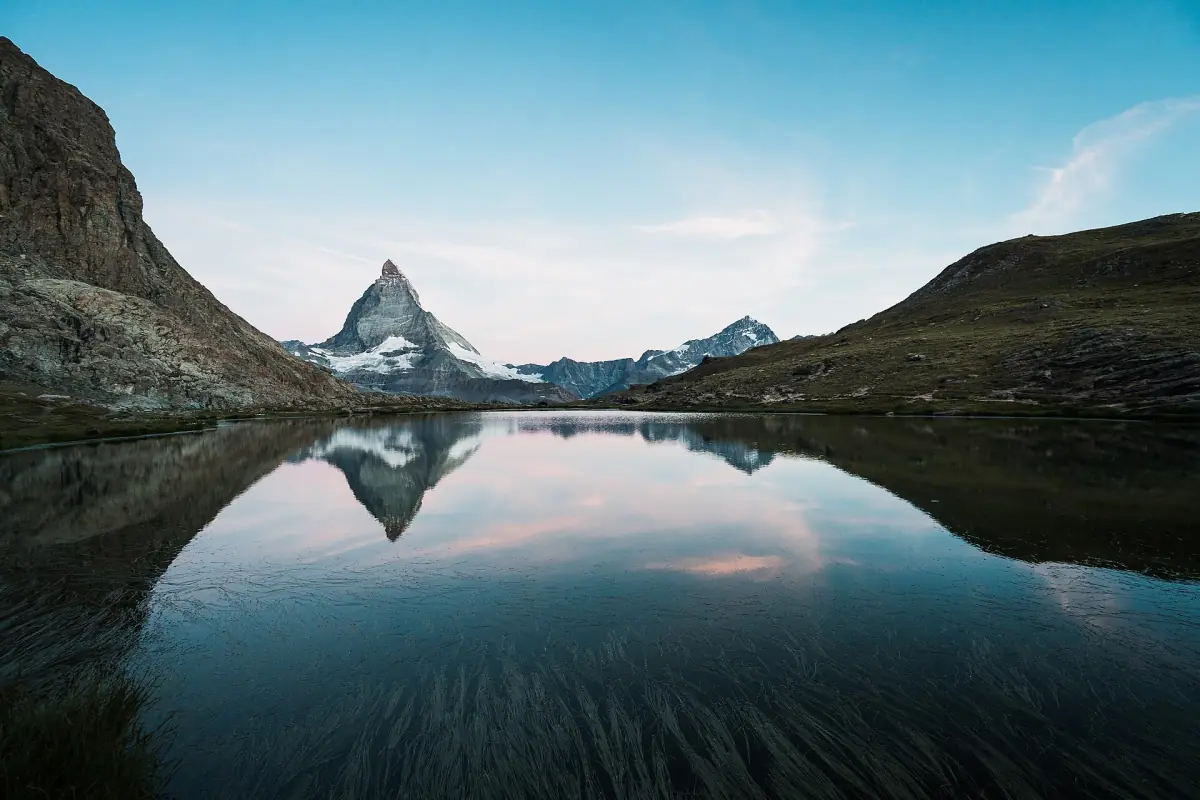 The Matterhorn reflected in the Riffelsee at sunrise